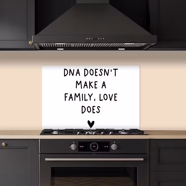 Kitchen splashback for hob - English quote "DNA doesn't make a family, love does" with a heart on a white background — 5